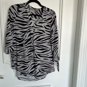 Animal print pullover blouse